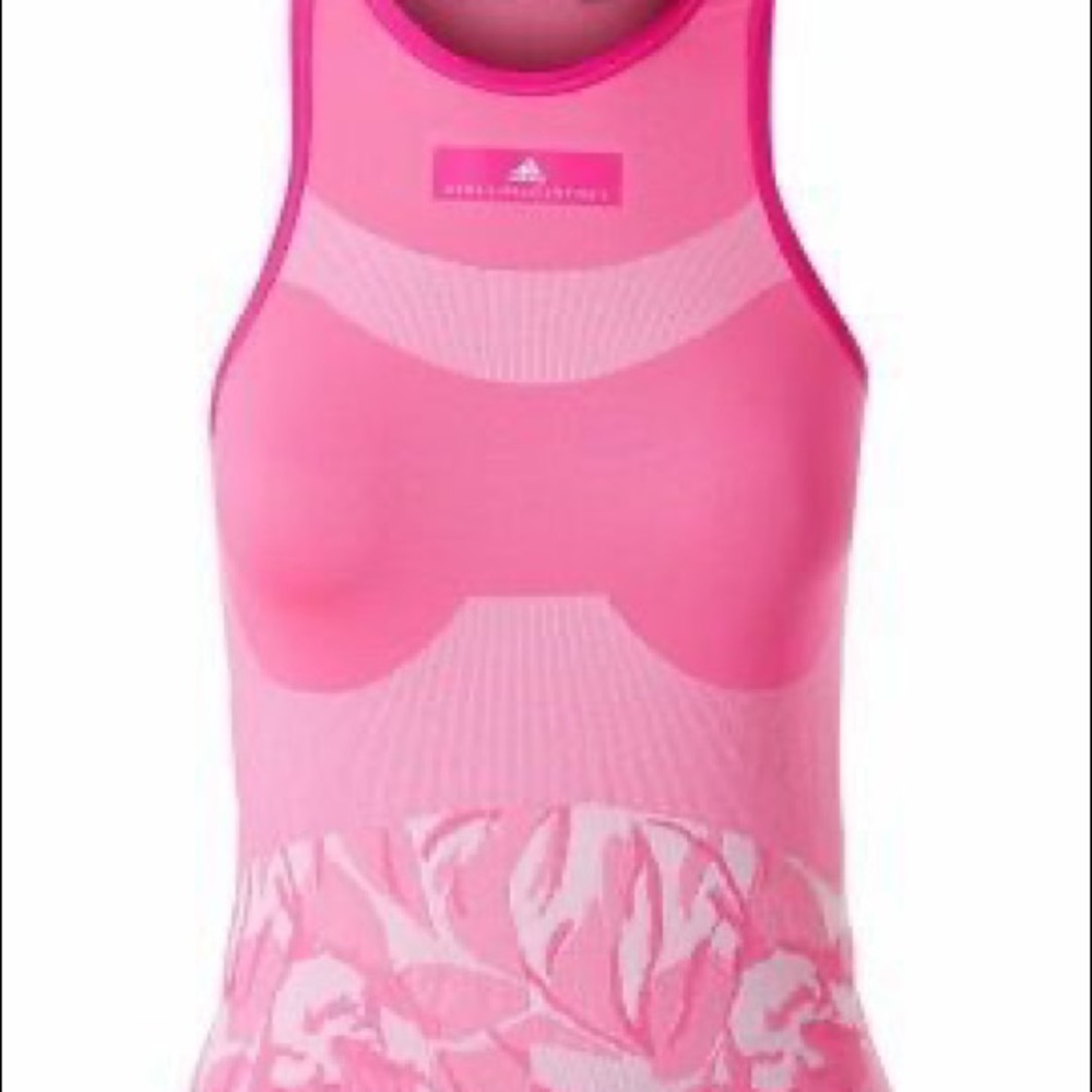 $7 w/ buy of any other item. Adidas by Stella McCartney Pink tennis top Sz S